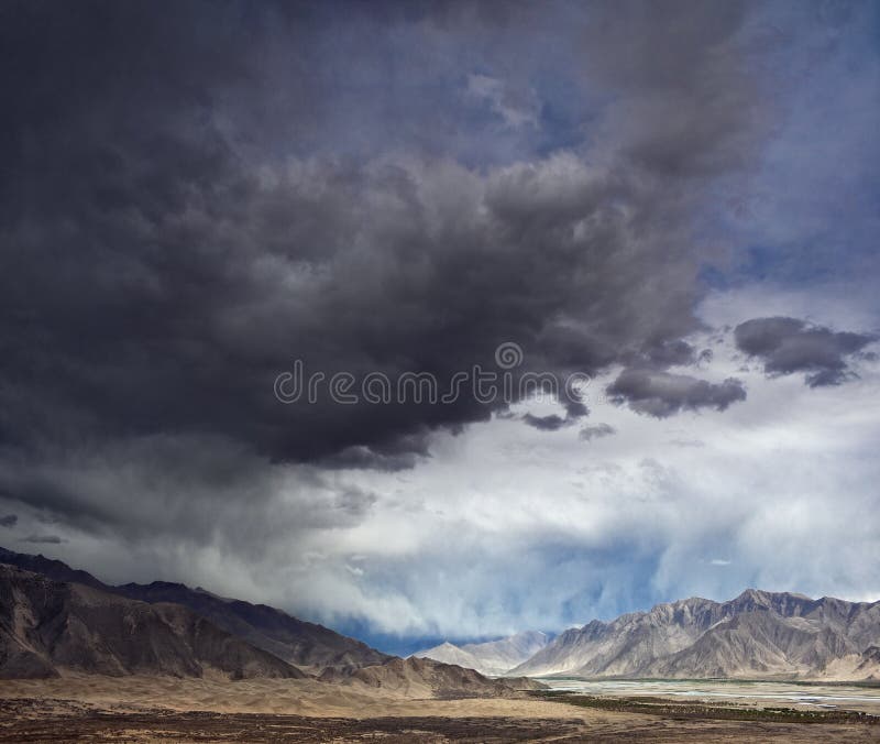 Mountain landscape with storm clouds before thunderstorm, Tibet nature shooting. Mountain landscape with storm clouds before thunderstorm, Tibet nature shooting