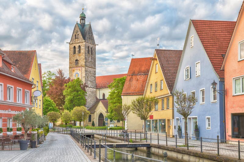 Colorful houses and bell tower of church of Our Lady in Memmingen, Bavaria, Germany. Colorful houses and bell tower of church of Our Lady in Memmingen, Bavaria, Germany