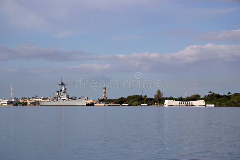 Battleship Missouri Memorial and Arizona Memorial at Pearl Harbor. View from the shoreside visitor center of the Arizona Memorial toward Ford Island. The Japanese surrender took place aboard the deck of the Missouri. Battleship Missouri Memorial and Arizona Memorial at Pearl Harbor. View from the shoreside visitor center of the Arizona Memorial toward Ford Island. The Japanese surrender took place aboard the deck of the Missouri.