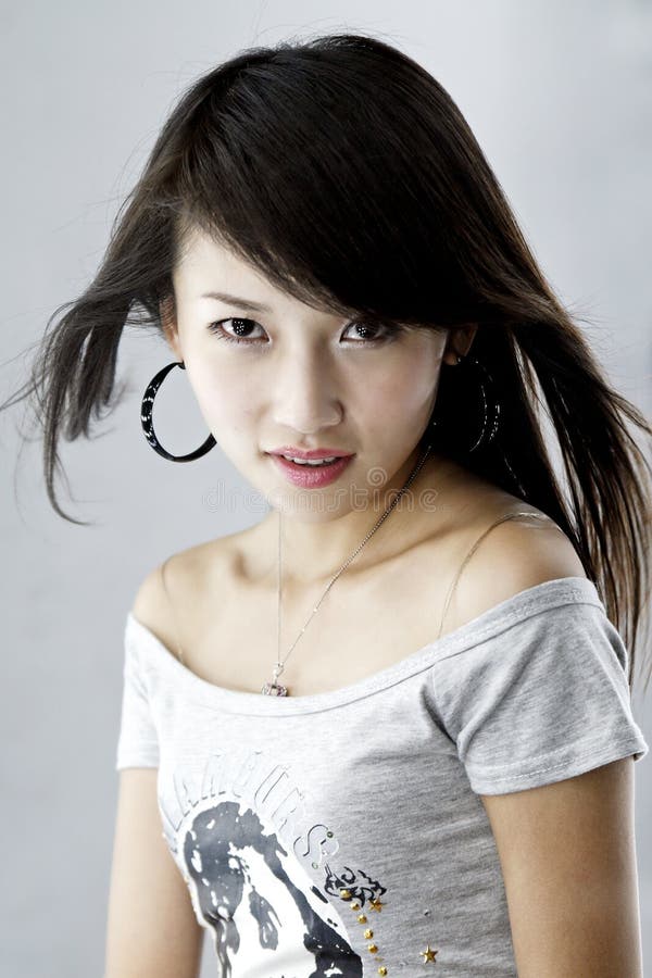 A fashionable Asian girl's portrait. A fashionable Asian girl's portrait.