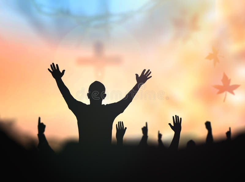 Praise and worship concept: Silhouette human raising hands to praying God on blurred cross with crown of thorn sunset background. Praise and worship concept: Silhouette human raising hands to praying God on blurred cross with crown of thorn sunset background