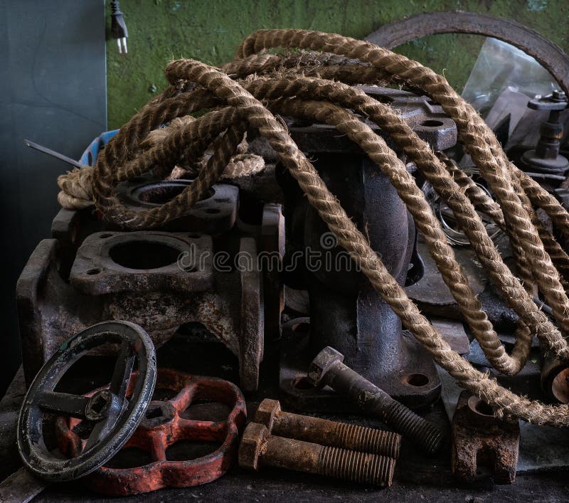 Industrial still life. Ropes, bolts and metal latches. A complex still life. Production in life. Industrial still life. Ropes, bolts and metal latches. A complex still life. Production in life.