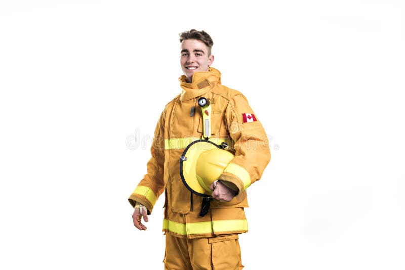 A Picture from a young and successful firefighter on studio. A Picture from a young and successful firefighter on studio