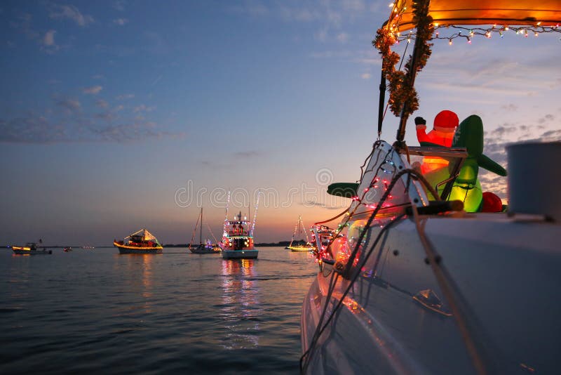 An inflatable Santa flies his airplane into a Florida boat parade -- a tropical tradition. An inflatable Santa flies his airplane into a Florida boat parade -- a tropical tradition.