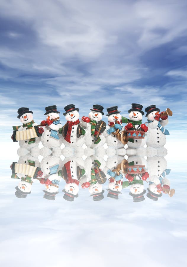 A group of snowmen playing music in the snow. A group of snowmen playing music in the snow
