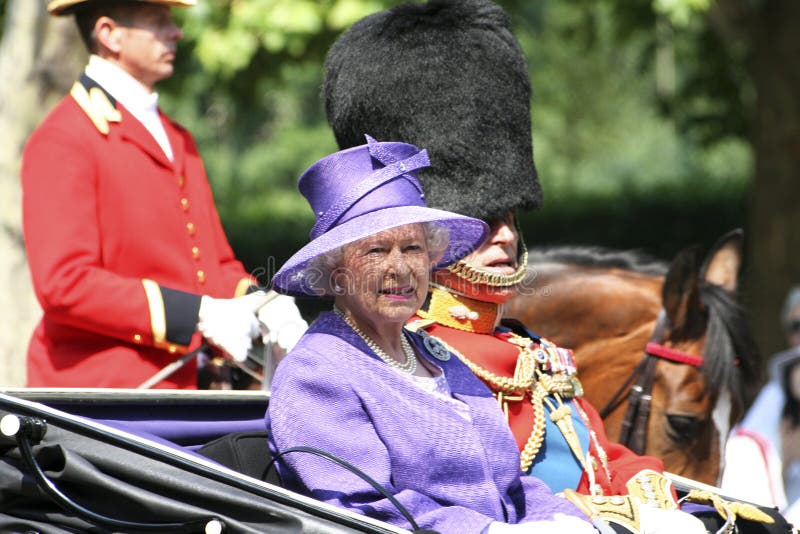 London, UK - June 17, 2006: Queen Elizabeth II and Prince Philip seating on the Royal Coach at Trooping the colour ceremony, also known as the Queen's Birthday Parade. London, UK - June 17, 2006: Queen Elizabeth II and Prince Philip seating on the Royal Coach at Trooping the colour ceremony, also known as the Queen's Birthday Parade