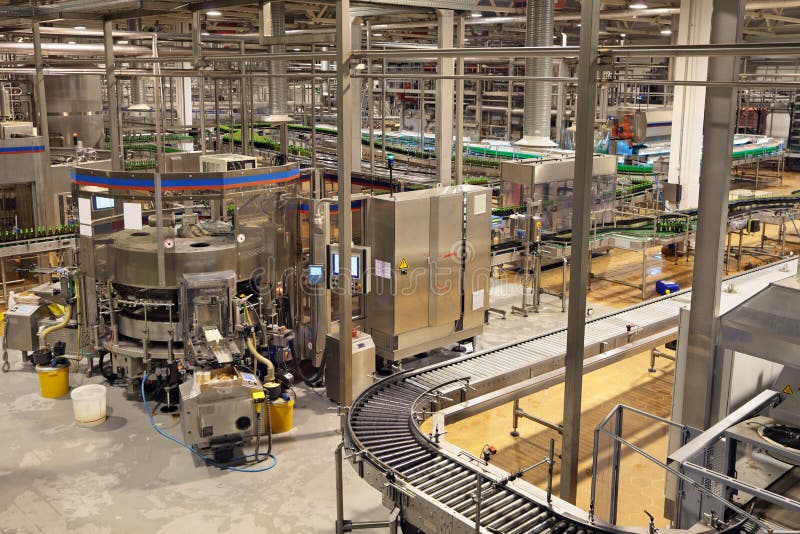 The interior of the brewery. The bottling of beer. Machine bottle labelling. The interior of the brewery. The bottling of beer. Machine bottle labelling