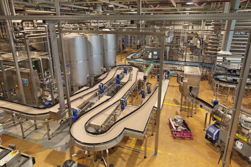 The interior of the brewery. The conveyor line for bottling of beer. The interior of the brewery. The conveyor line for bottling of beer