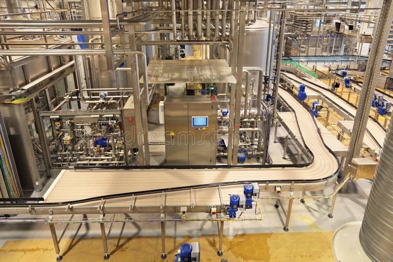 The interior of the brewery. The conveyor line for bottling of beer. The interior of the brewery. The conveyor line for bottling of beer