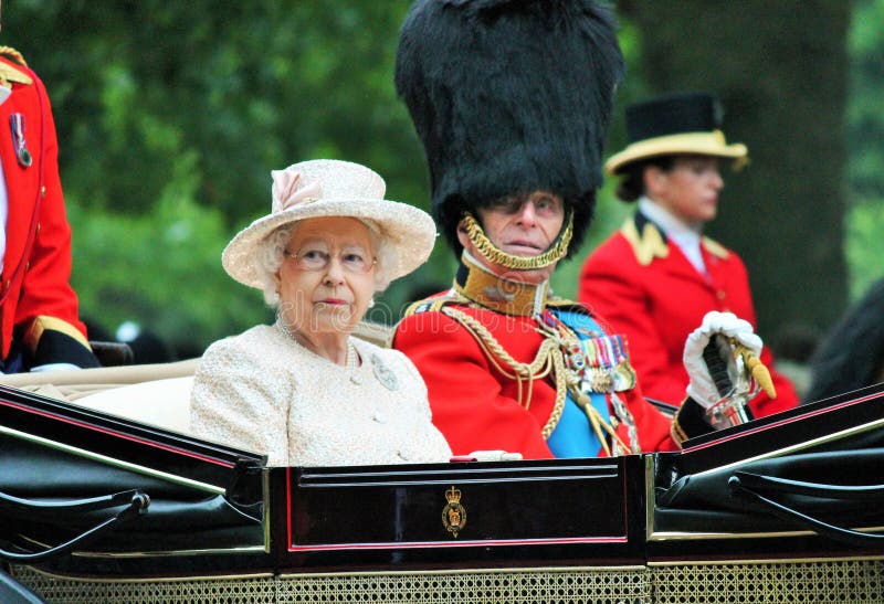 QUEEN ELIZABETH & PRINCE PHILIP DUKE OF EDINBURGH, London, England - June 13, 2015: Queen Elizabeth II in an open carriage with Prince Philip for trooping the colour 2015 to mark the Queens official birthday, London, UK - stock photo, stock photograph, image, picture, editorial. QUEEN ELIZABETH & PRINCE PHILIP DUKE OF EDINBURGH, London, England - June 13, 2015: Queen Elizabeth II in an open carriage with Prince Philip for trooping the colour 2015 to mark the Queens official birthday, London, UK - stock photo, stock photograph, image, picture, editorial