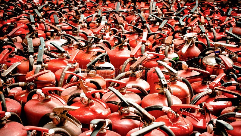 Close up of the fire extinguisher used (fire, tank, background). Close up of the fire extinguisher used (fire, tank, background)