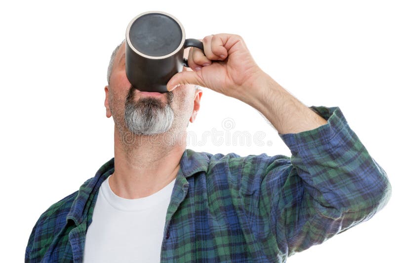 Single middle aged bearded man in flannel and tee shirt gulping down the last drop of coffee from a dark mug over white background. Single middle aged bearded man in flannel and tee shirt gulping down the last drop of coffee from a dark mug over white background
