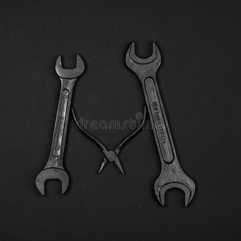 Letter M. Alphabet made of repair tools. Creative black and white font. Letter M. Alphabet made of repair tools. Creative black and white font