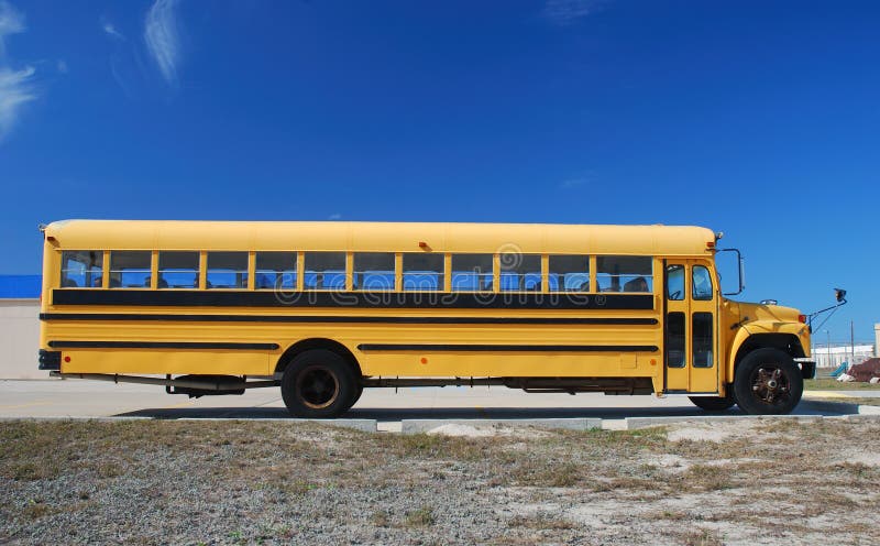 Yellow american school bus against blue sky. Yellow american school bus against blue sky