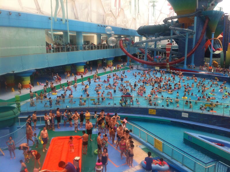 People enjoying water time in Summer, Beijing water Cube, indoor entertainment. People enjoying water time in Summer, Beijing water Cube, indoor entertainment