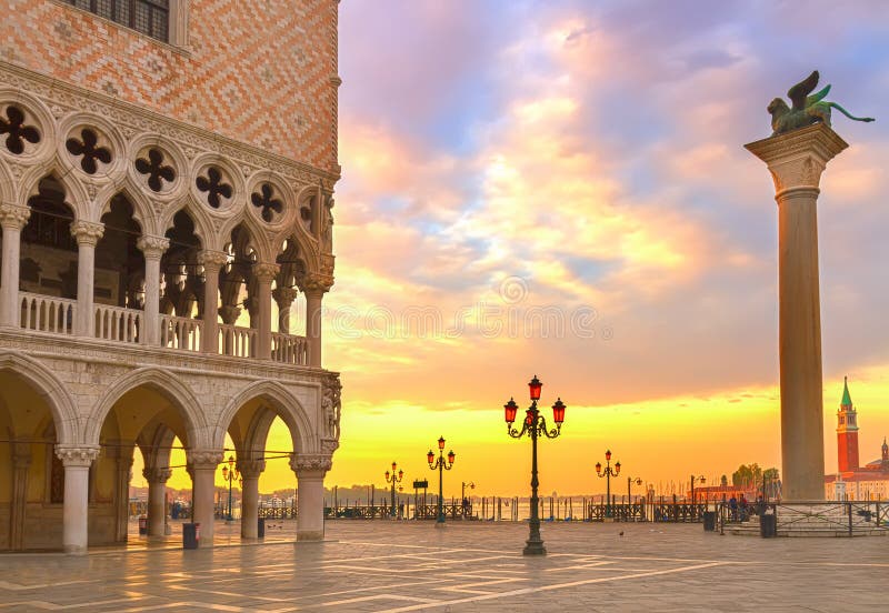 Famouse Doge palace, column with winged lion and San Marco square at sunrise, Venice, Italy. Famouse Doge palace, column with winged lion and San Marco square at sunrise, Venice, Italy