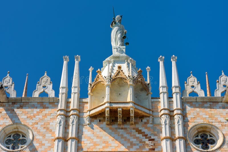 Doge`s Palace, or Palazzo Ducale, in Venice, Italy. Detail of the facade. Dode`s Palace is one of the main tourist destination in Venice. Doge`s Palace, or Palazzo Ducale, in Venice, Italy. Detail of the facade. Dode`s Palace is one of the main tourist destination in Venice.