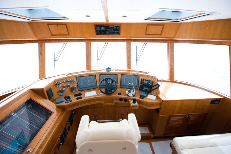 Interior steering wheel area in a luxury yacht. Interior steering wheel area in a luxury yacht