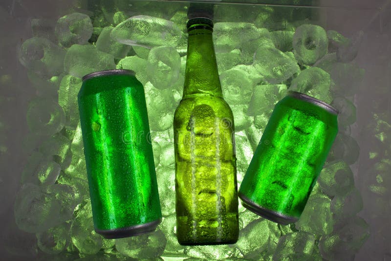 Cans and bottle with cold drinks can be alcohol, juice, soda, water are inside cooler surrounded by ice. Cans and bottle with cold drinks can be alcohol, juice, soda, water are inside cooler surrounded by ice