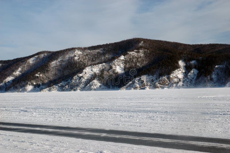 Winter ice road on the stood Krasnoyarsk water basin. Winter ice road on the stood Krasnoyarsk water basin.