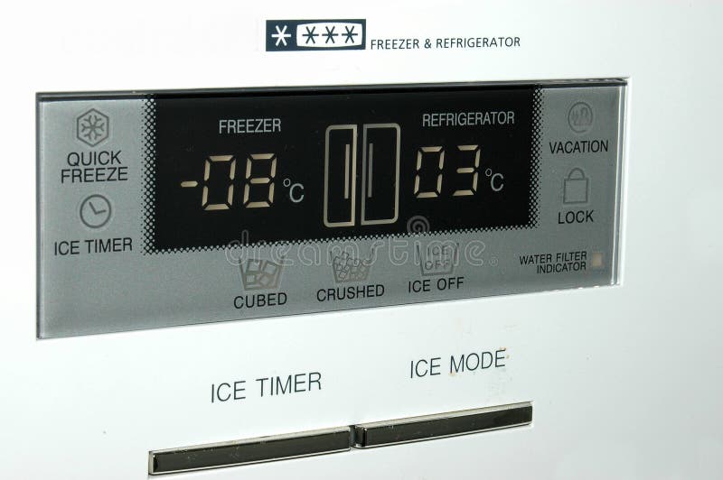 A closeup of a refrigerator and freezer combination with ice-maker. A closeup of a refrigerator and freezer combination with ice-maker