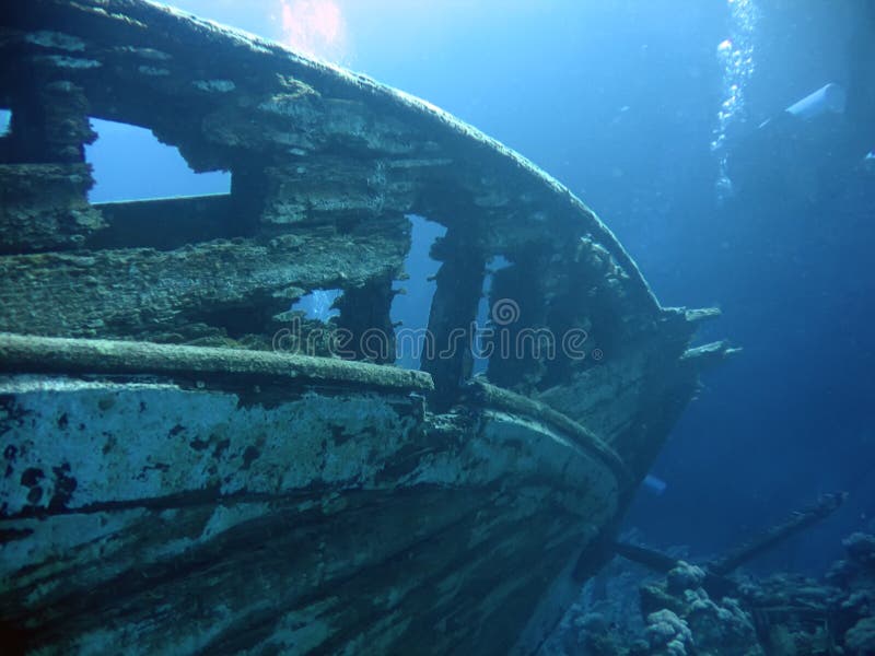 Underwater landscape with boat fragments. The Red Sea. Underwater landscape with boat fragments. The Red Sea