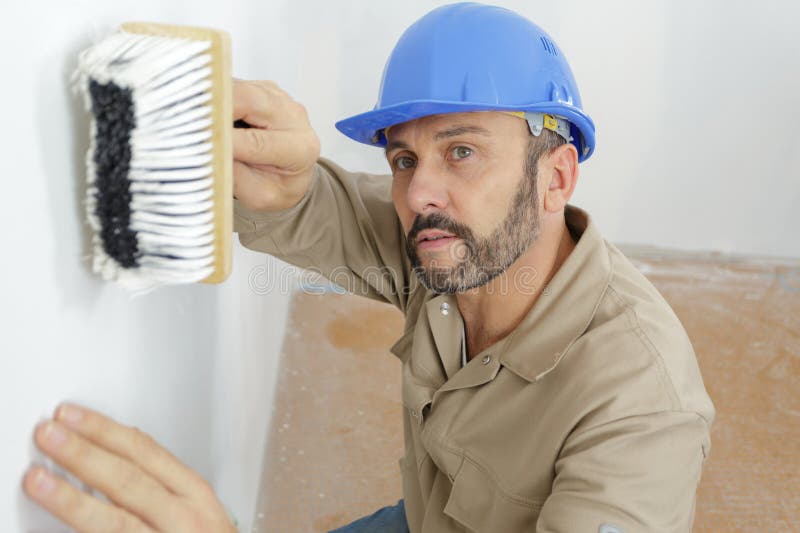 刷子的男工 库存图片
