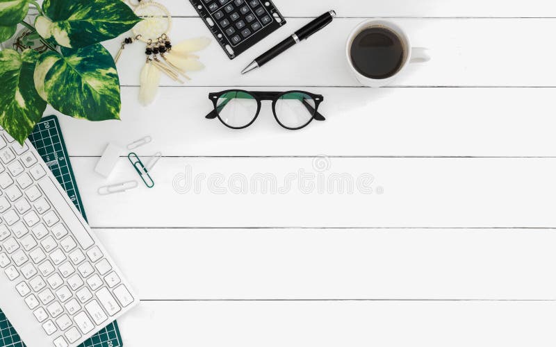 Flat lay of office desk work space table with computer wireless keyboard and stationary in home office on white wood table. Top view with copy space for add text or graphic above accounting background black blank business clean coffee company concept corporate creative design designer desktop education empty glasses green idea internet laptop market marketing modern notebook overhead place plan plant student style tabletop wooden workspace. Flat lay of office desk work space table with computer wireless keyboard and stationary in home office on white wood table. Top view with copy space for add text or graphic above accounting background black blank business clean coffee company concept corporate creative design designer desktop education empty glasses green idea internet laptop market marketing modern notebook overhead place plan plant student style tabletop wooden workspace