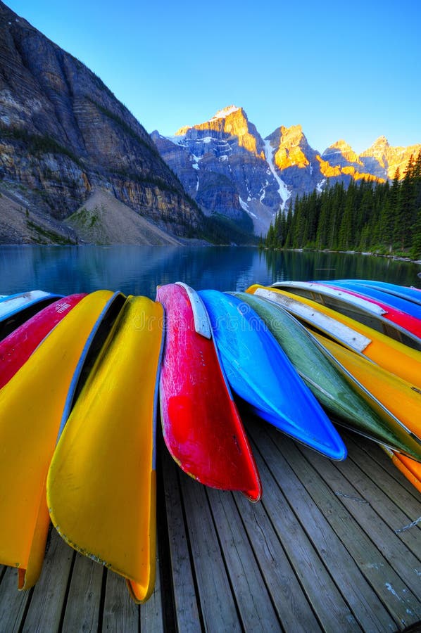 Canoes rest on the dock of Lake Moraine, Banff, Canada. Canoes rest on the dock of Lake Moraine, Banff, Canada