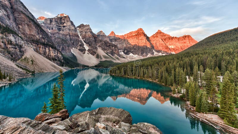 Moraine Lake in Banff National Park in Alberta Canada taken at the peak color of sunrise. Moraine Lake in Banff National Park in Alberta Canada taken at the peak color of sunrise