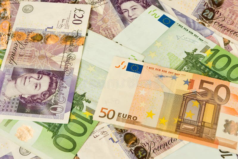 Pile of money containing pounds and euros (20, 50 and 100 bills). Pile of money containing pounds and euros (20, 50 and 100 bills)