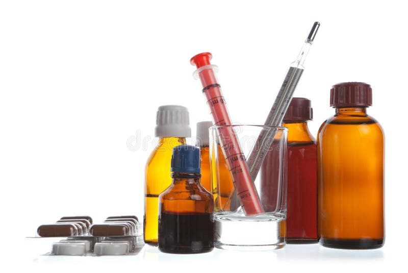 Medical supplies - vial bottles and pills on white background. Medical supplies - vial bottles and pills on white background