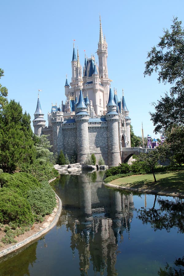 Walt Disney World Cinderella`s Castle and bridge rising above moat at Magic Kingdom in Orlando, Florida. Walt Disney World Cinderella`s Castle and bridge rising above moat at Magic Kingdom in Orlando, Florida