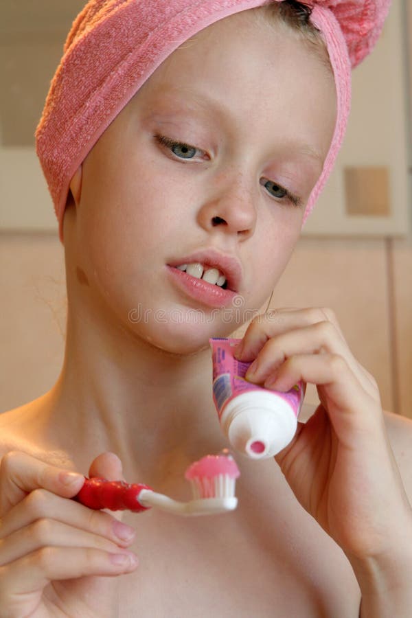 Young girl brushing her teeth. Young girl brushing her teeth