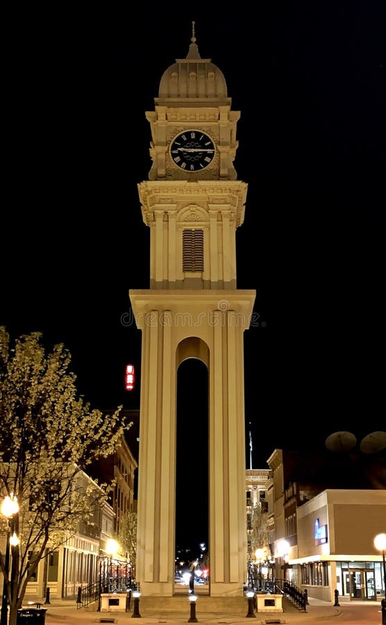 Historic Clock Tower in Dubuque, Iowa City Lights at Night - Portrait View. Historic Clock Tower in Dubuque, Iowa City Lights at Night - Portrait View