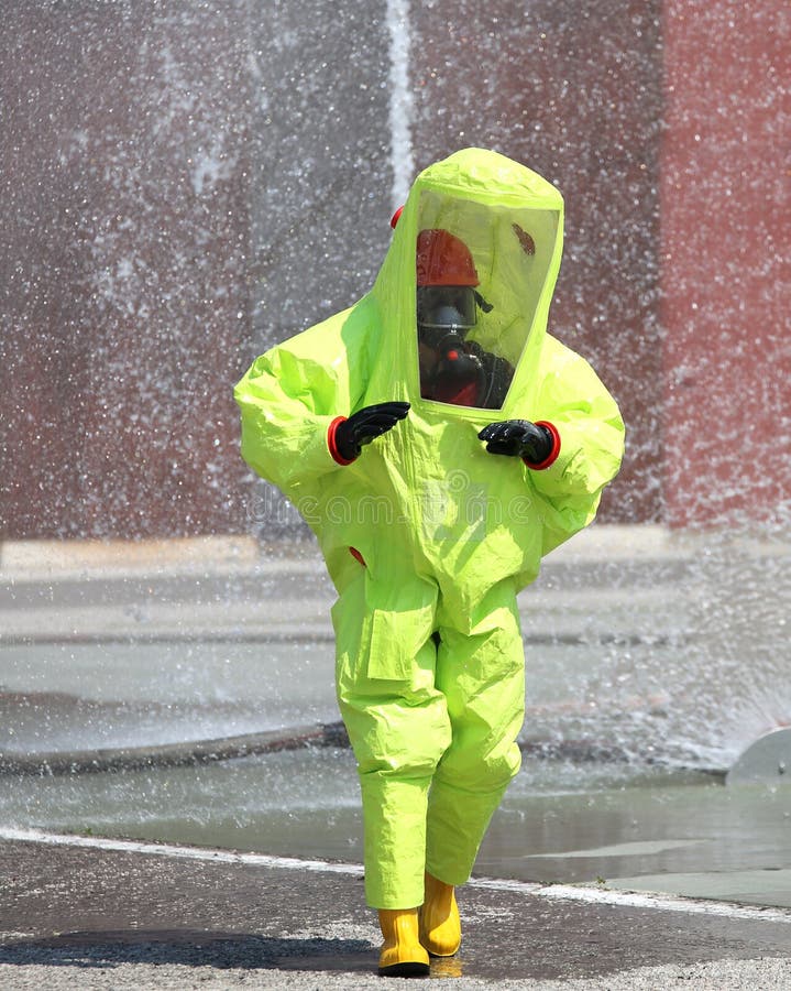 Man with a Yellow protective suit against chemical and bacteriological agents. Man with a Yellow protective suit against chemical and bacteriological agents
