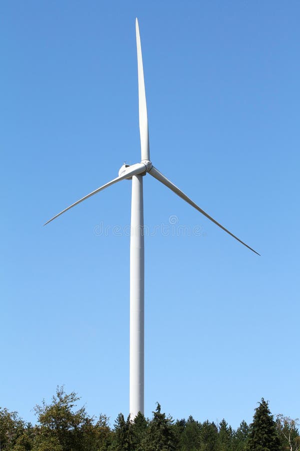 Wind power station - wind turbine against the blue sky. Wind power station - wind turbine against the blue sky