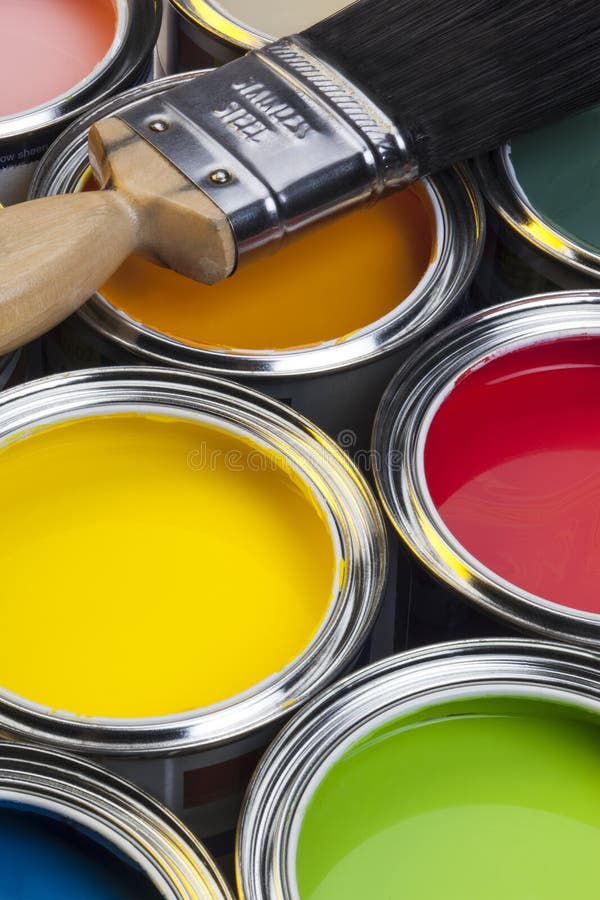 Painting and Decorating - Tins of paint and paintbrush. Painting and Decorating - Tins of paint and paintbrush