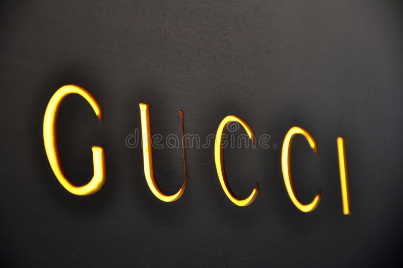 Italian fashion sign in Florence, Italy. Gucci boutique sign. Italian fashion sign in Florence, Italy. Gucci boutique sign.