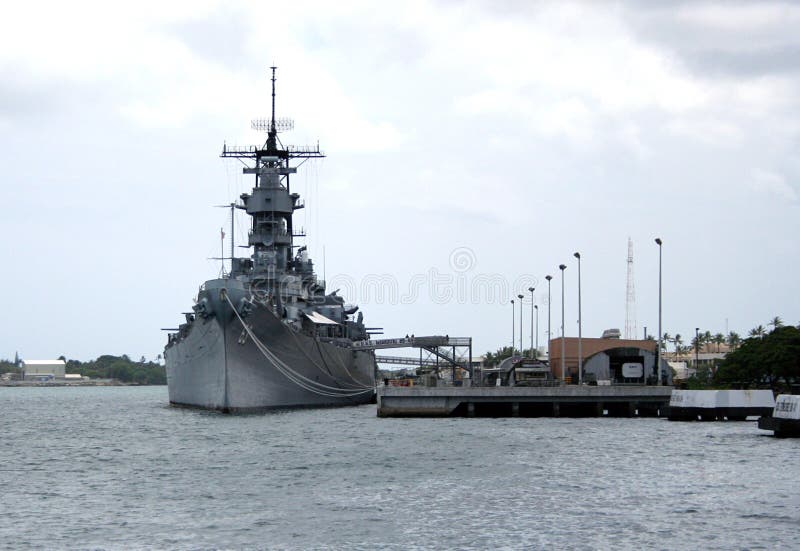 A battleship of the United States Navy sits at Pearl Harbor on Oahu, Hawaii. A battleship of the United States Navy sits at Pearl Harbor on Oahu, Hawaii.