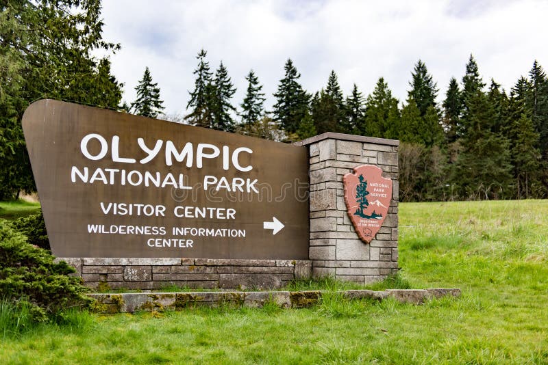 A Olympic National Park Sign. A Olympic National Park Sign