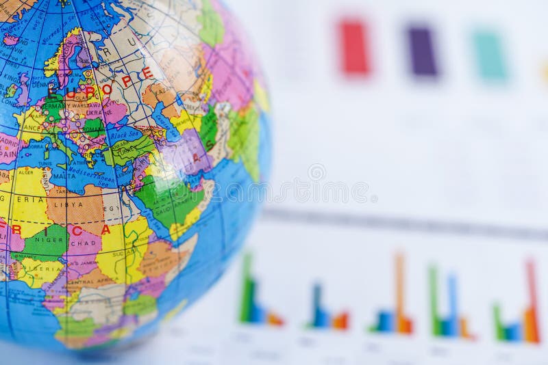 Chart graph paper with globe world Europe map on . Finance, Account, Statistics, Investment, Analytic research data economy and Business company meeting concept. Chart graph paper with globe world Europe map on . Finance, Account, Statistics, Investment, Analytic research data economy and Business company meeting concept.