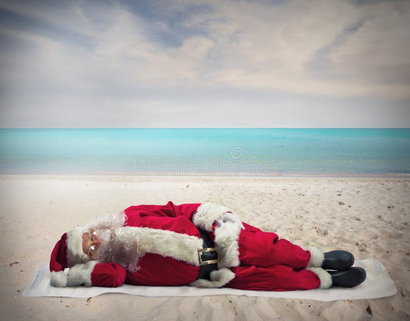 Santa Claus sleeping at the hot beach. Santa Claus sleeping at the hot beach