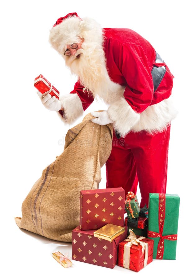 Santa Claus finally found the right gift in his gifts sack. Santa Claus finally found the right gift in his gifts sack