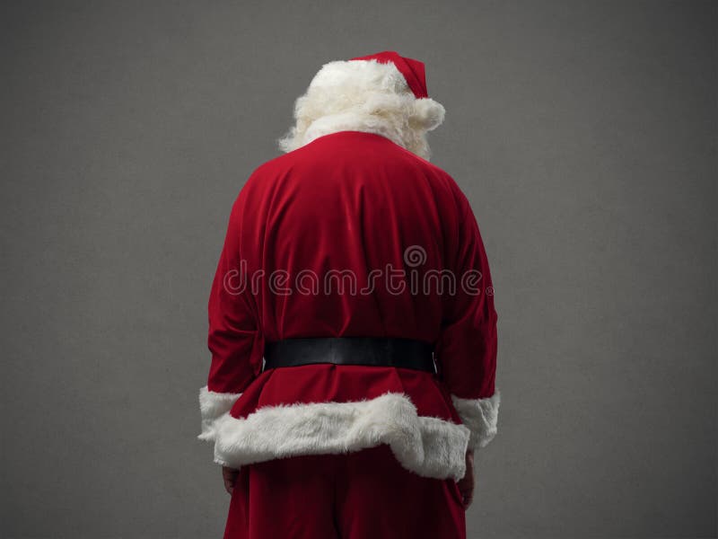 Sad Santa Claus looking down, back view, Christmas and celebrations concept. Sad Santa Claus looking down, back view, Christmas and celebrations concept