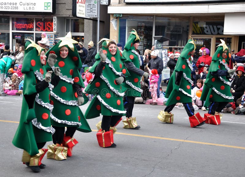 People dressed up as Christmas Tree in the Santa Parade, Toronto, Canada, 2010. People dressed up as Christmas Tree in the Santa Parade, Toronto, Canada, 2010