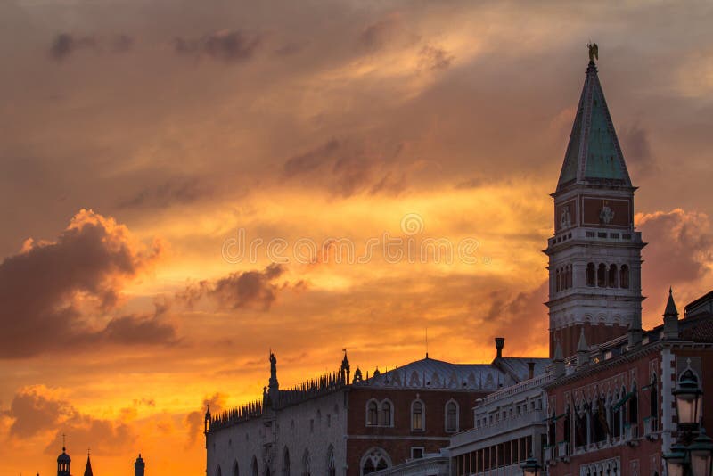 St Mark Campanile and Doge`s Palace at sunset in Venice, Italy. St Mark Campanile and Doge`s Palace at sunset in Venice, Italy