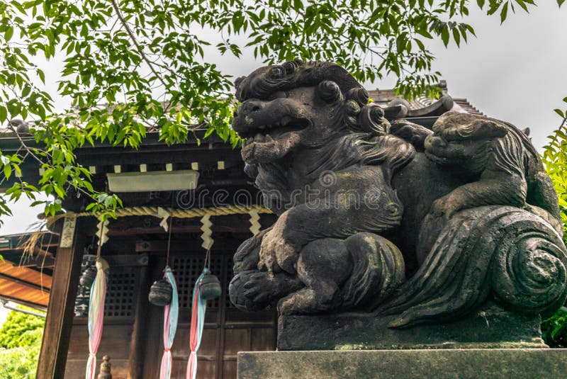 A stone dragon in a Shintoist shrine in Tokyo - 1. A stone dragon in a Shintoist shrine in Tokyo - 1