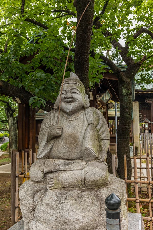 Stone statue in a Shintoist shrine in Tokyo - 3. Stone statue in a Shintoist shrine in Tokyo - 3