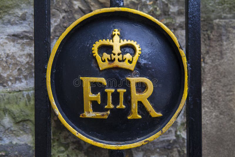 Queen Elizabeth II symbol on a gate at the Tower of London. Queen Elizabeth II symbol on a gate at the Tower of London.